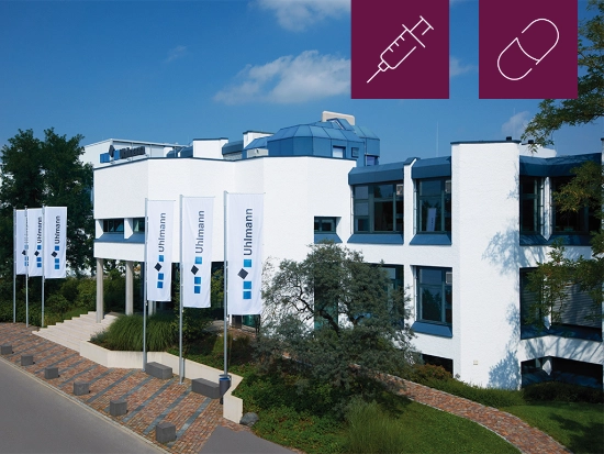 The Uhlmann Pac-Systeme company building, featuring two icons, a syringe and a tablet, which symbolize the company's business segments