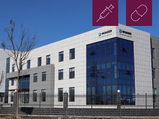 The Wonder Packing Machinery corporate building, featuring two icons symbolizing the pharmaceutical segment.