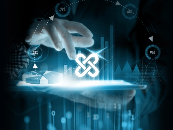 A hand touches a tablet with an illuminated icon surrounded by charts and data