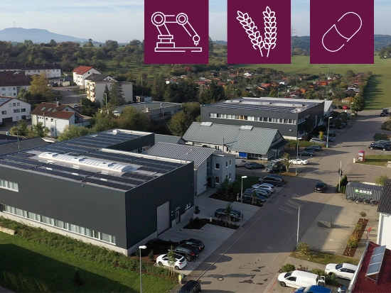 The Goldfuss Automation site viewed from above, featuring three icons symbolizing laboratory automation, agriculture, and pharmaceutical segments.